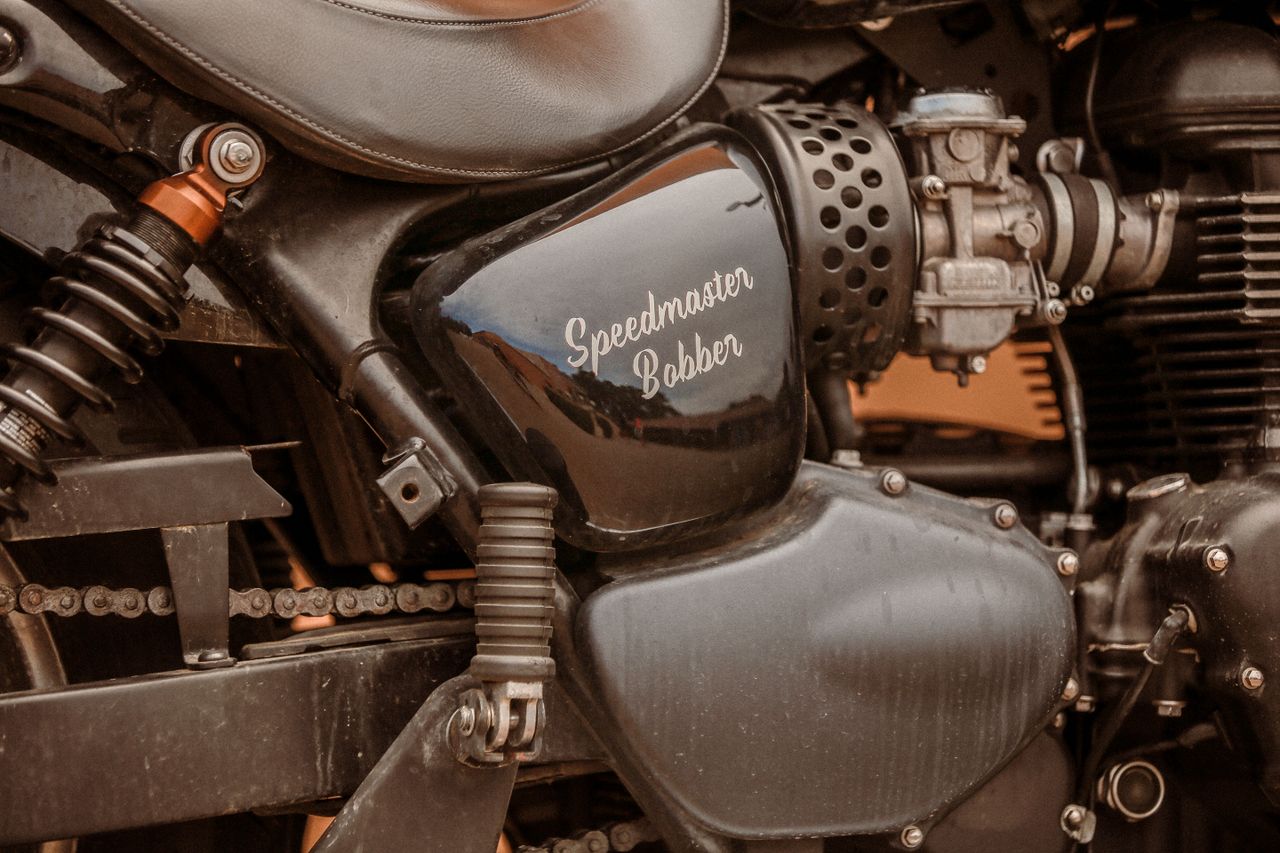 Detailed view of a Speedmaster Bobber motorcycle engine and design.